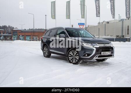 MOSCOW, RUSSIA - JANUARY 30, 2021 Mitsubishi Outlander. Third generation of Japanese compact crossover SUV produced by Mitsubishi Motors. Model year 2 Stock Photo