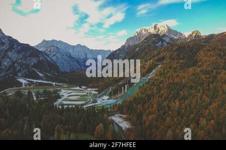 Aerial view of Tamar valley with Planica ski jumping hills visible in the foreground. Autumn view of the ski jump area in Planica. Stock Photo