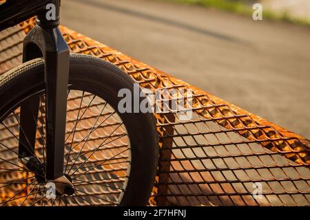 Bmx Bike Is Waiting For A Start On A Bmx Start Ramp Visible Only Front Tire And Forks Rusty Start Gate Stock Photo Alamy