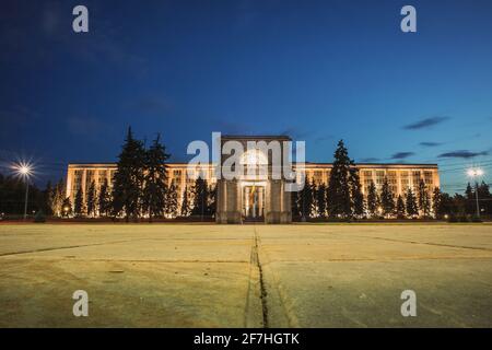 The Triumphal Arch in front of the Government building in Chisinau, Moldova on a warm summer evening at a blue hour. Frog view photo Stock Photo