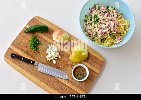 Homemade gourmet stuffed pork burger ingredients for preparing seasonal summer bbq and picnic food. Photo concept, food background, lifestyle, cooking Stock Photo