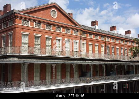 The historic Pontalba buildings in the New Orleans French Quarter, built during the 1840s. First recorded use in the city of cast iron balconies. Stock Photo