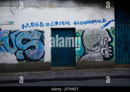 7th April 2021, La Paz, Bolivia. (Carlos) Mesa = Economic Crisis sprayed on the wall of a house in central La Paz. Carlos Mesa was the main opposition candidate in the presidential elections held in Bolivia in October 2019 (which were annulled after allegations of fraud) and October 2020. His party is currently the main opposition party in the Congress. Stock Photo