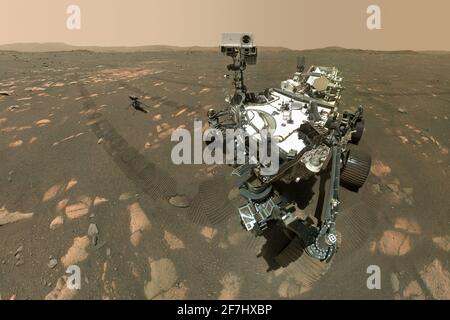 NASA's Perseverance Mars rover took a selfie with the Ingenuity helicopter on April 6, 2021, using the WATSON (Wide Angle Topographic Sensor for Operations and eNgineering) camera located at the end of the rover's long robotic arm. Perseverance's selfie with Ingenuity is constructed of 62 individual images, taken in sequence while the rover was looking at the helicopter, then again while looking at the WATSON camera, stitched together once they are sent back to Earth. The Curiosity rover takes similar selfies using a camera on its robotic arm. NASA/UPI Credit: UPI/Alamy Live News Stock Photo