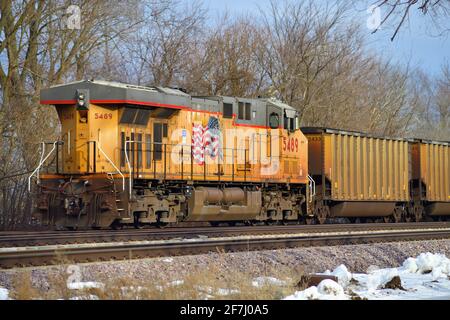 La Fox, Illinois, USA. A Union Pacific locomotive at the rear of a loaded coal train serves as a distributed power unit (DPU). Stock Photo