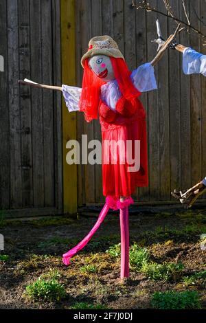 Scarecrow couple in garden Stock Photo