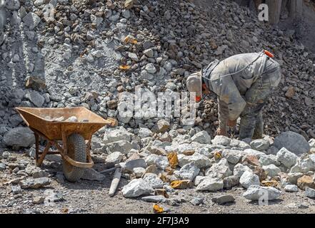 Bolivian mine worker portrait in the high altitude silver mine of Potosi, Bolivia. Stock Photo