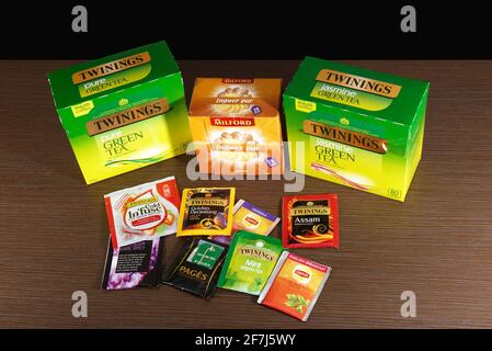 London, United Kingdom - April 04, 2021: Stack of famous British tea Twinings and other different brands of traditional tea bags sold in supermarkets Stock Photo