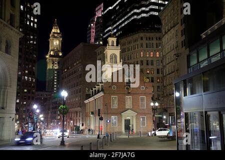 Night view of Old State House in downtown with Custom House Tower in the background.Boston.Massachusetts.USA Stock Photo