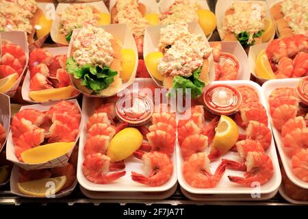 Shrimp cocktails and lobster rolls for sale in Quincy Market Building.Faneuil Hall Marketplace.Boston.Massachusetts.USA Stock Photo