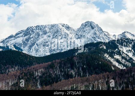 Giewont mountain summit with a metal cross on the top in Tatra Mountains near Zakopane in Poland Stock Photo