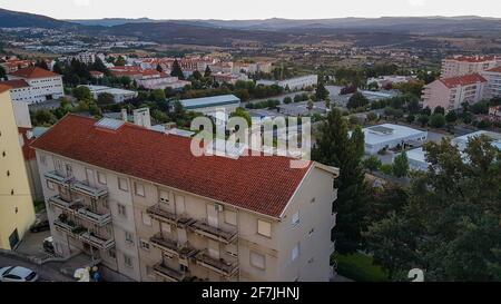 Aerial view of Portuguese town Covilha and district Castelo Branco. View from mountains Serra de Estrela. Stock Photo