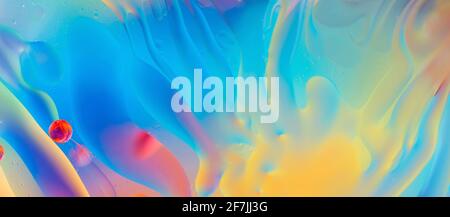 abstract colorful backdrop with oil drops and waves on water surface Stock Photo