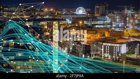 Composition of net of connections over a cityscape with blue lines in background Stock Photo