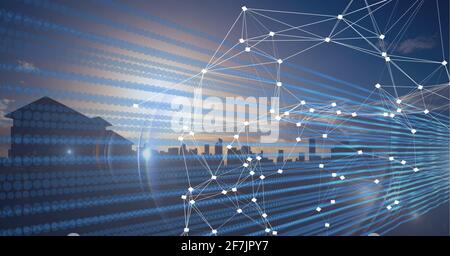 Composition of net of connections over a cityscape with blue lines in background Stock Photo