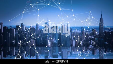 Composition of net of connections over a cityscape in background Stock Photo