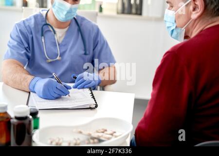 Close up of senior patient during visit at the doctor Stock Photo