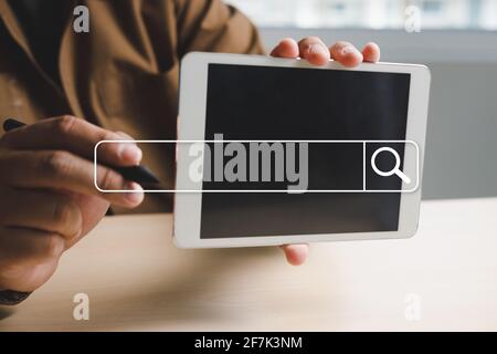 businessman using Searching Browsing Internet of things (IoT) internet network for Searching Browsing Internet Data Stock Photo