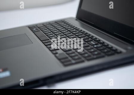 closeup of a notebook keyword. Laptob Keyboard Selective Focus Stock Photo