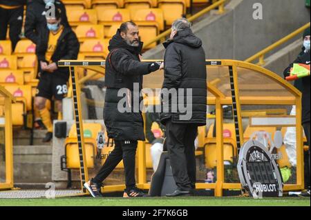 Nuno Espirito Santo manager of Wolverhampton Wanderers bumps fists with Sam Allardyce manager of West Bromwich Albion after West Bromwich win Wolverhampton 2-3 Stock Photo