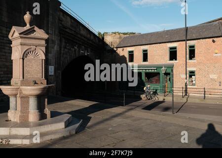 NEWCASTLE, 12TH MAY 2019: A man cycling past Station East pub in Gateshead. Stock Photo