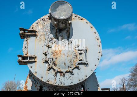 Smokebox door and headlight on vintage steam locomotive front view Stock Photo