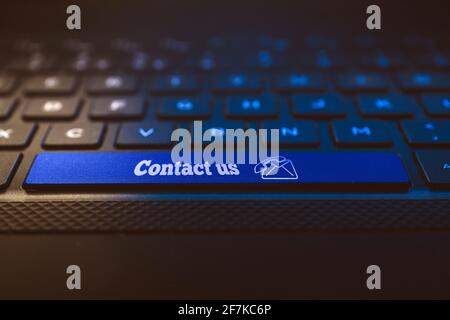 Contact us conecpt on keyboard key. Email and phone call icon Stock Photo