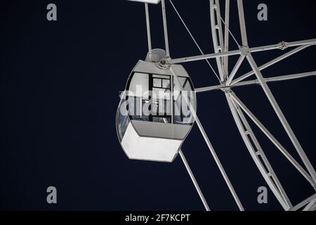 Ferris wheel on the night sky on a winter day Stock Photo