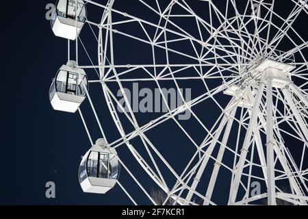 Ferris wheel on the night sky on a winter day Stock Photo