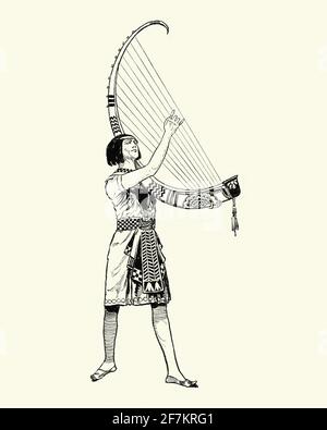 Costume from Cleopatre from the ballet by Mikhail Fokine. Ancient Egyptian harpist, harp Stock Photo