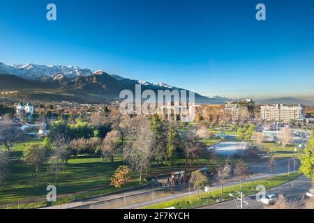 View of Los Dominicos Park and neighborhood with Los Andes Mountain Range as a backdrop in Las Condes district, Santiago de Chile Stock Photo