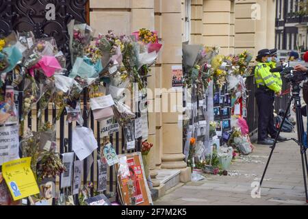 London, United Kingdom. 8th April 2021. Flowers and photographs outside the Myanmar embassy in Mayfair. Myanmar's ambassador to the UK, Kyaw Zwar Minn, has been locked out of the embassy, which he has described as  a 'coup'. Credit: Vuk Valcic/Alamy Live News Stock Photo