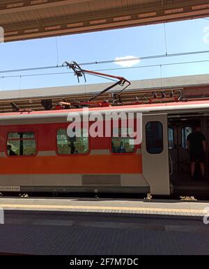 Gdansk, North Poland - August 14, 2020: Intercity colorful electric train bogie and passenger inside it. Stock Photo