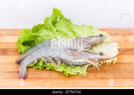 Fresh prawns in wooden board Stock Photo