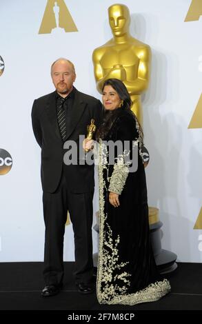 LOS ANGELES, FEB 28 - Louis C K , Sharmeen Obaid-Chinoy at the 88th Annual  Academy Awards, Press Room at the Dolby Theater on February 28, 2016 in Los  Angeles, CA 12343827 Stock Photo at Vecteezy
