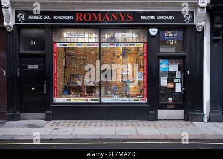 Old shop front of Romanys hardware store, builders merchants and ironmongers in Soho on 29th January 2021 in London, United Kingdom. Stock Photo