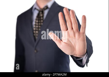 businessman gesture stop. man Showing Stop. Businessman Gesturing Stop Sign. Businessman in suit making stop gesture, holding his palm outward isolate Stock Photo