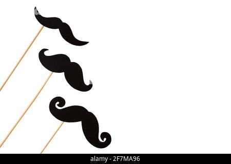 happy father day card, black mustache on stick on white background with copy space, international mens day Stock Photo