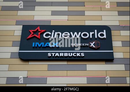 Watford, UK.  8 April 2021. Signage for the Cineworld cinema complex in Atria Watford shopping centre (formerly Intu Watford) in Watford High Street, Hertfordshire.  The company recently announced an annual loss of £2.2bn and there are concerns about its future as the business saw an 80% drop in revenues due to the ongoing coronavirus pandemic.  Whilst non-essential shops will re-open on 12 April in accordance with the UK government’s roadmap, cinemas will re-open on 17 May.  Credit: Stephen Chung / Alamy Live News Stock Photo