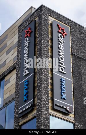 Watford, UK.  8 April 2021. Signage for the Cineworld cinema complex in Atria Watford shopping centre (formerly Intu Watford) in Watford High Street, Hertfordshire.  The company recently announced an annual loss of £2.2bn and there are concerns about its future as the business saw an 80% drop in revenues due to the ongoing coronavirus pandemic.  Whilst non-essential shops will re-open on 12 April in accordance with the UK government’s roadmap, cinemas will re-open on 17 May.  Credit: Stephen Chung / Alamy Live News Stock Photo