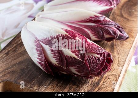 Healthy food, fresh Belgian endive red chicory lof lettuce close up Stock Photo