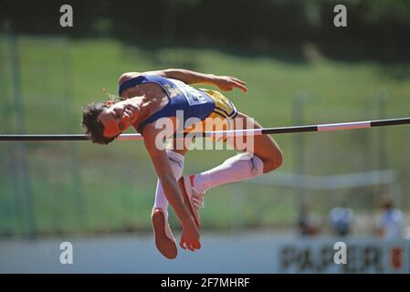 Athletics. Mens' High Jump. Man clearing the bar. Stock Photo