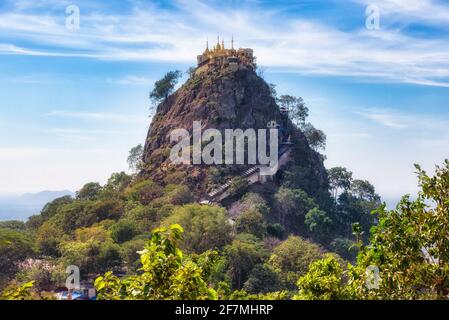 View of Mount Popa in Myanmar. Mount Popa is an extinct volcano of 1518 metres (4981 feet) above sea level. Now is a pilgrimage site Stock Photo