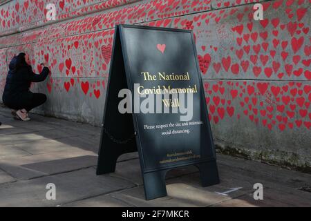 London (UK): the 'completed' national covid memorial wall on London's South Bank - (On the opposite river bank sits the houses of parliament.)