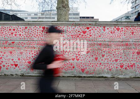 London (UK): the 'completed' national covid memorial wall on London's South Bank - (On the opposite river bank sits the houses of parliament.)