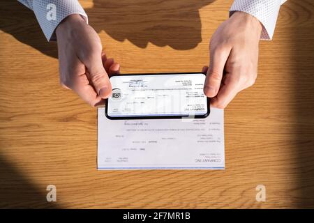 Remote Check Deposit Using Mobile Remote. Online Capture Stock Photo