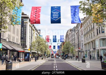 London, UK. 08th Apr, 2021. New banners in Oxford Street, London, ahead of the further relaxation of lockdown restrictions. Shops, restaurants and other businesses are set to reopen on 12th April. Credit: SOPA Images Limited/Alamy Live News Stock Photo