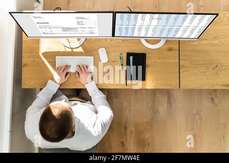 Spreadsheet Analyst Employee Worker. Medical Report On Computer Stock Photo