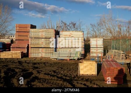Parts from a scaffold on the storage yard of a construction site in Magdeburg in Germany Stock Photo
