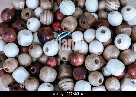 Colourful wooden craft beads pattern Stock Photo - Alamy